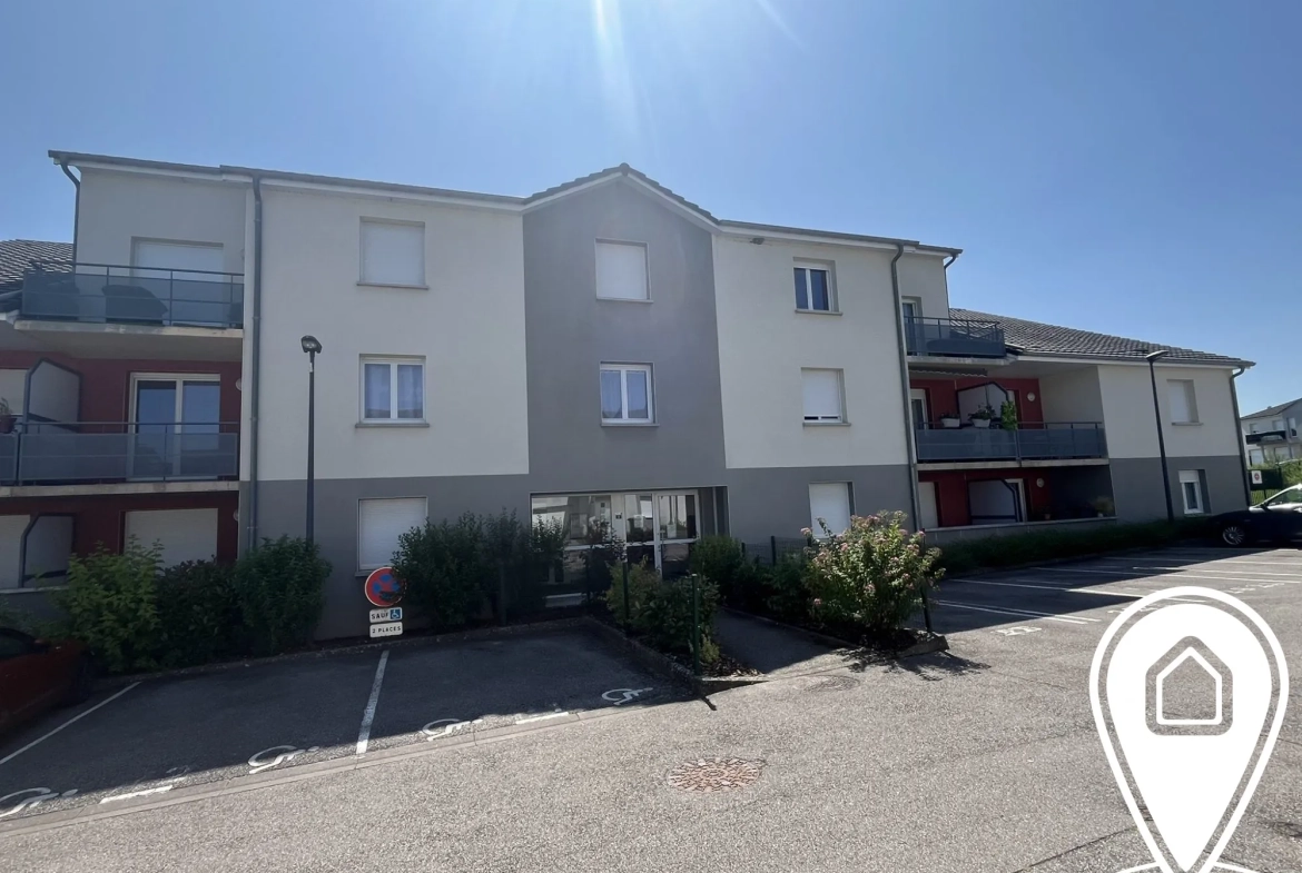 Appartement T2/T3 en rez-de-chaussée à Golbey avec terrasse et stationnement 