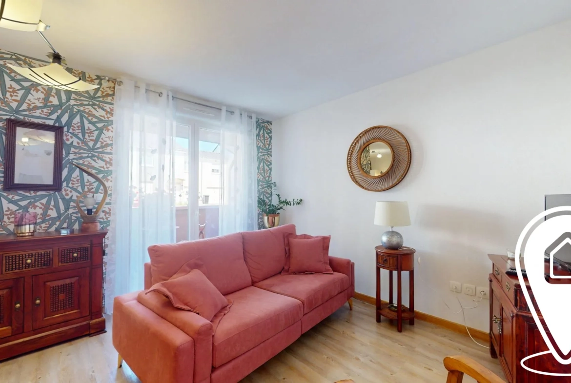Appartement T2/T3 en rez-de-chaussée à Golbey avec terrasse et stationnement 