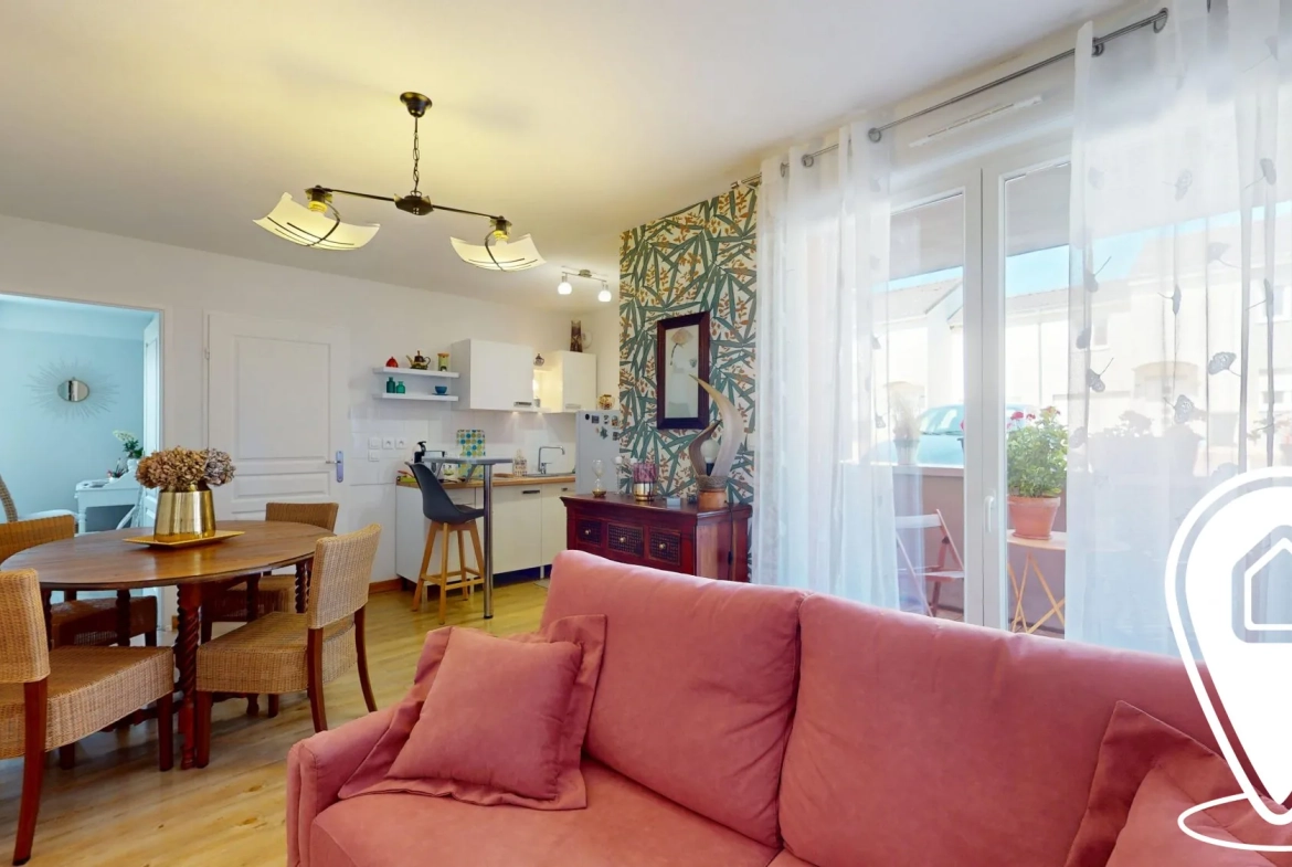 Appartement T2/T3 en rez-de-chaussée à Golbey avec terrasse et stationnement 