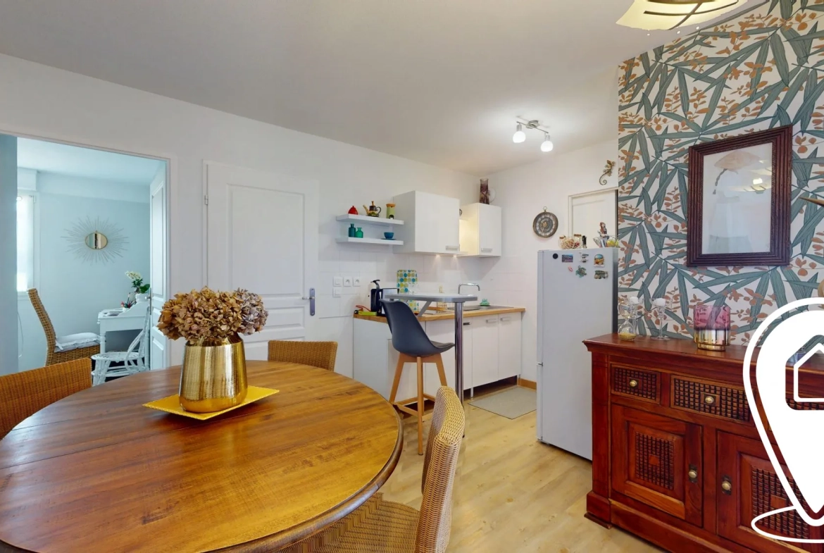 Appartement T2/T3 en rez-de-chaussée à Golbey avec terrasse et stationnement 