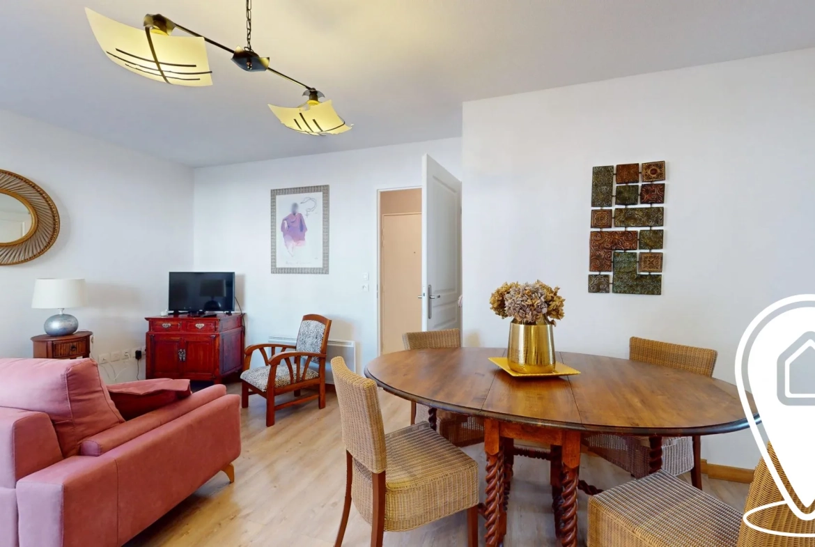 Appartement T2/T3 en rez-de-chaussée à Golbey avec terrasse et stationnement 