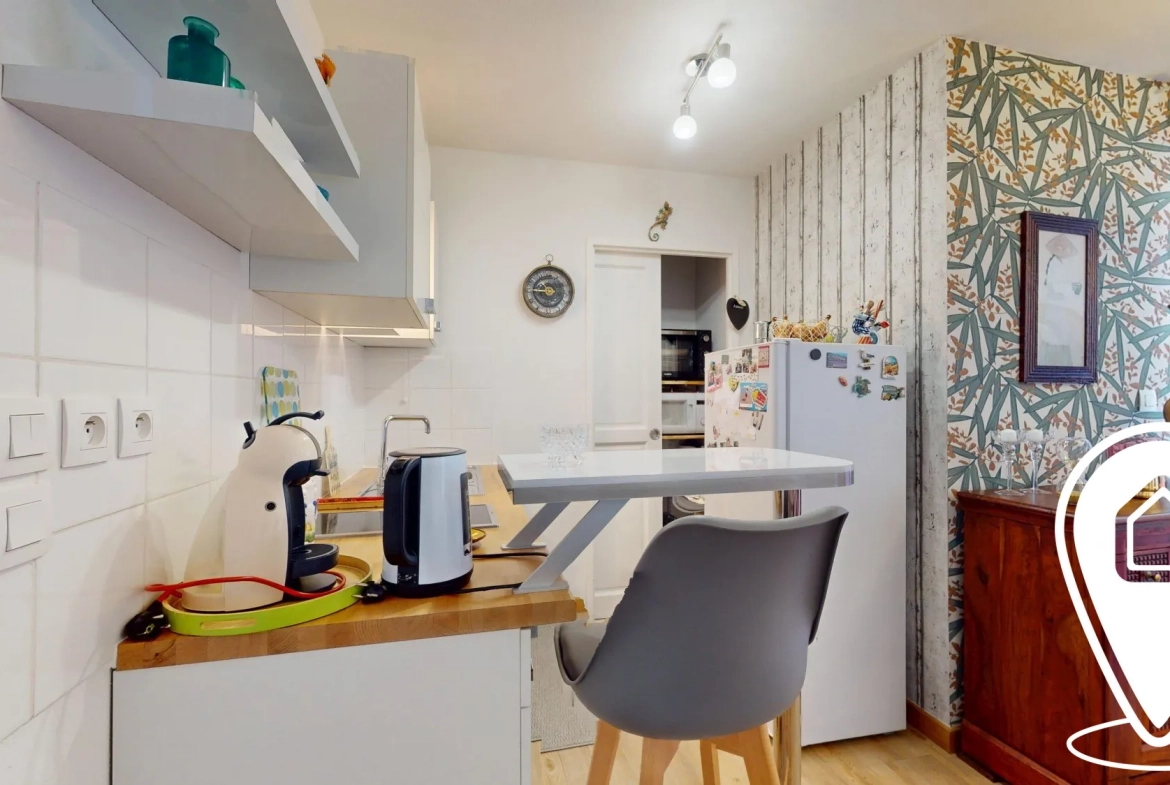 Appartement T2/T3 en rez-de-chaussée à Golbey avec terrasse et stationnement 
