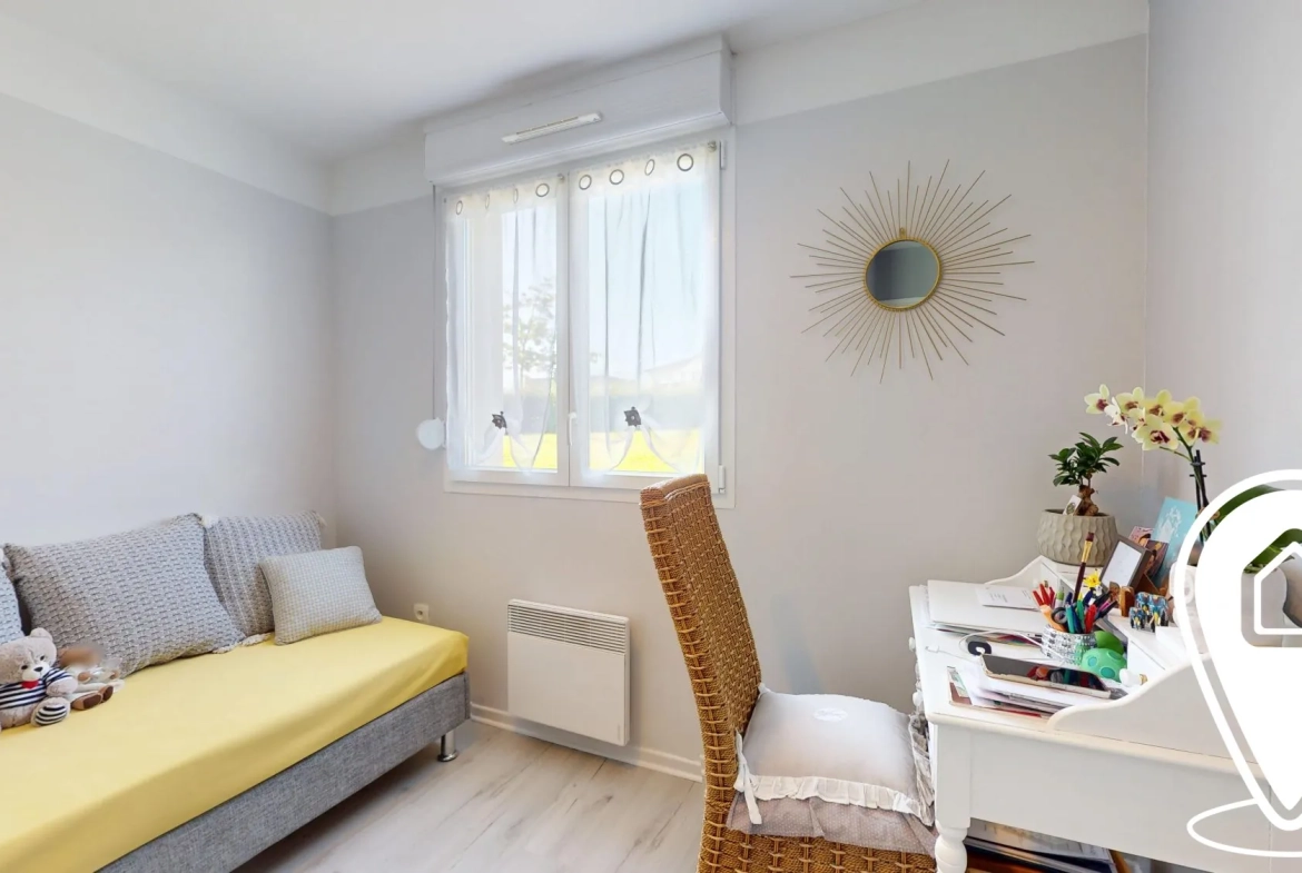 Appartement T2/T3 en rez-de-chaussée à Golbey avec terrasse et stationnement 