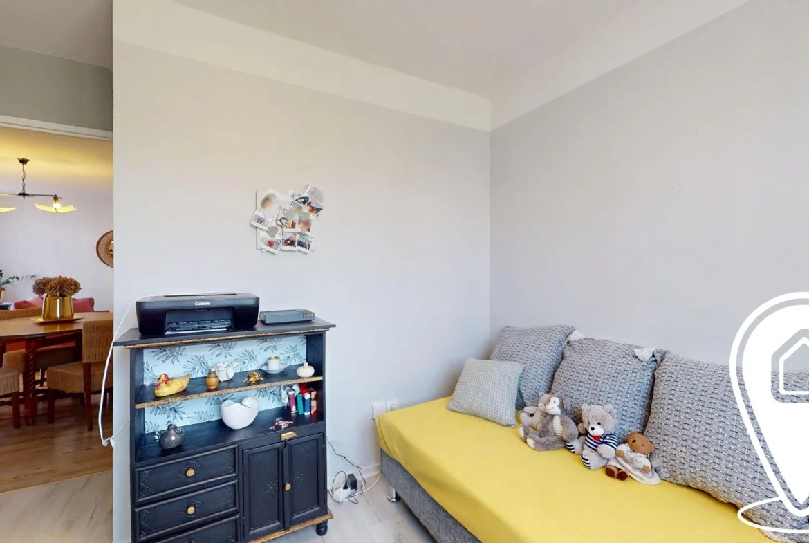 Appartement T2/T3 en rez-de-chaussée à Golbey avec terrasse et stationnement 