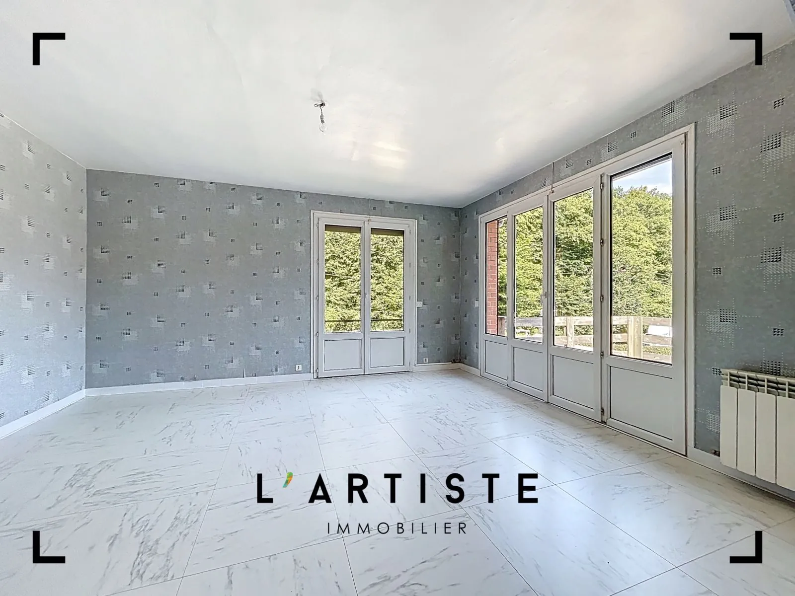 Maison de plain-pied à vendre à Elbeuf avec jardin et sous-sol complet 