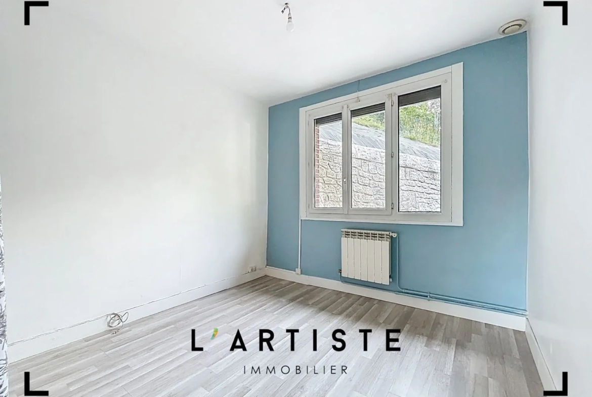 Maison de plain-pied à vendre à Elbeuf avec jardin et sous-sol complet 