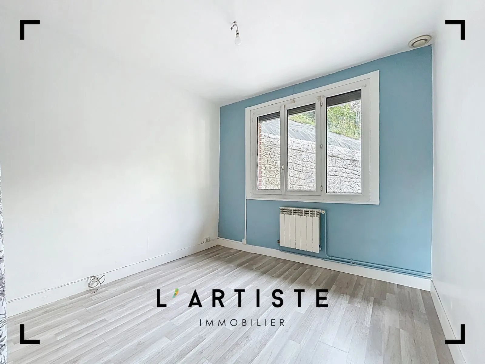 Maison de plain-pied à vendre à Elbeuf avec jardin et sous-sol complet 