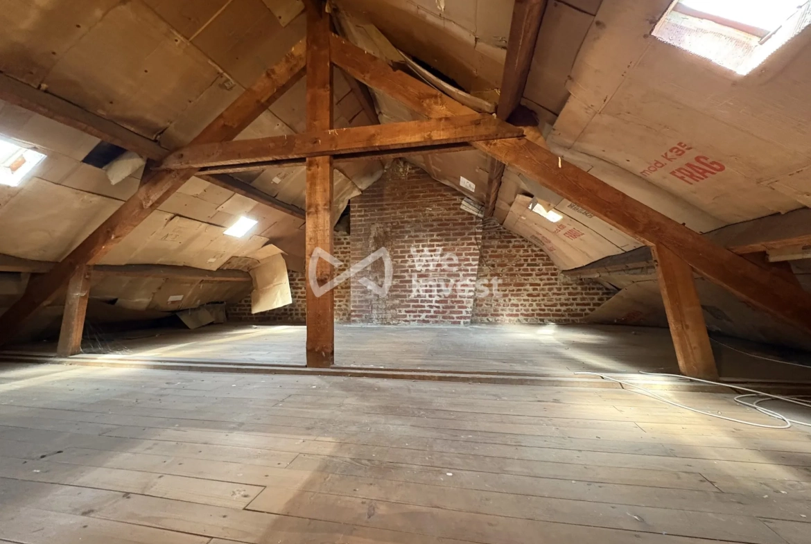 Maison à vendre à Aulnoye-Aymeries de 70 m² avec jardin et potentiel de rénovation 