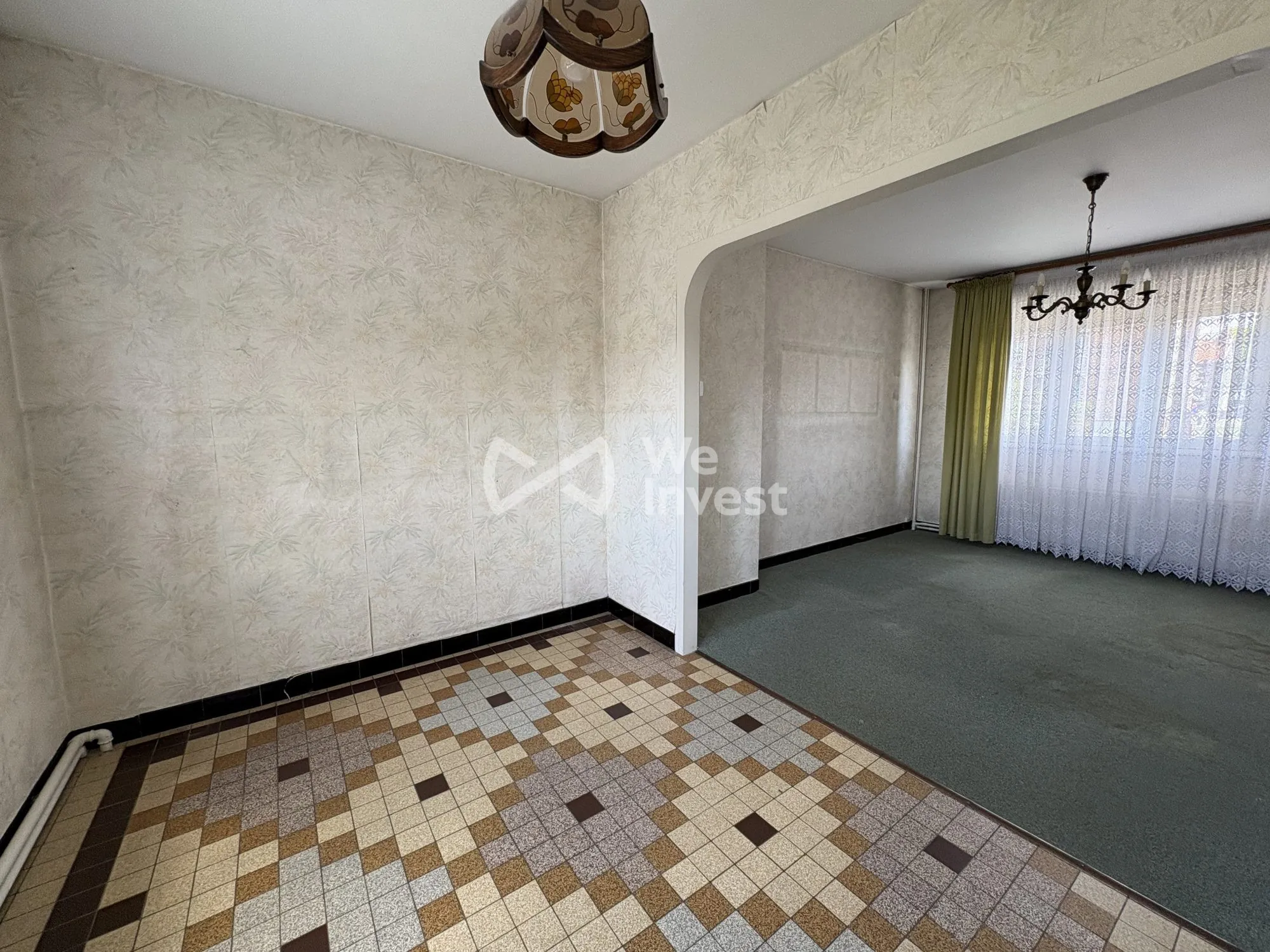 Maison à vendre à Aulnoye-Aymeries de 70 m² avec jardin et potentiel de rénovation 