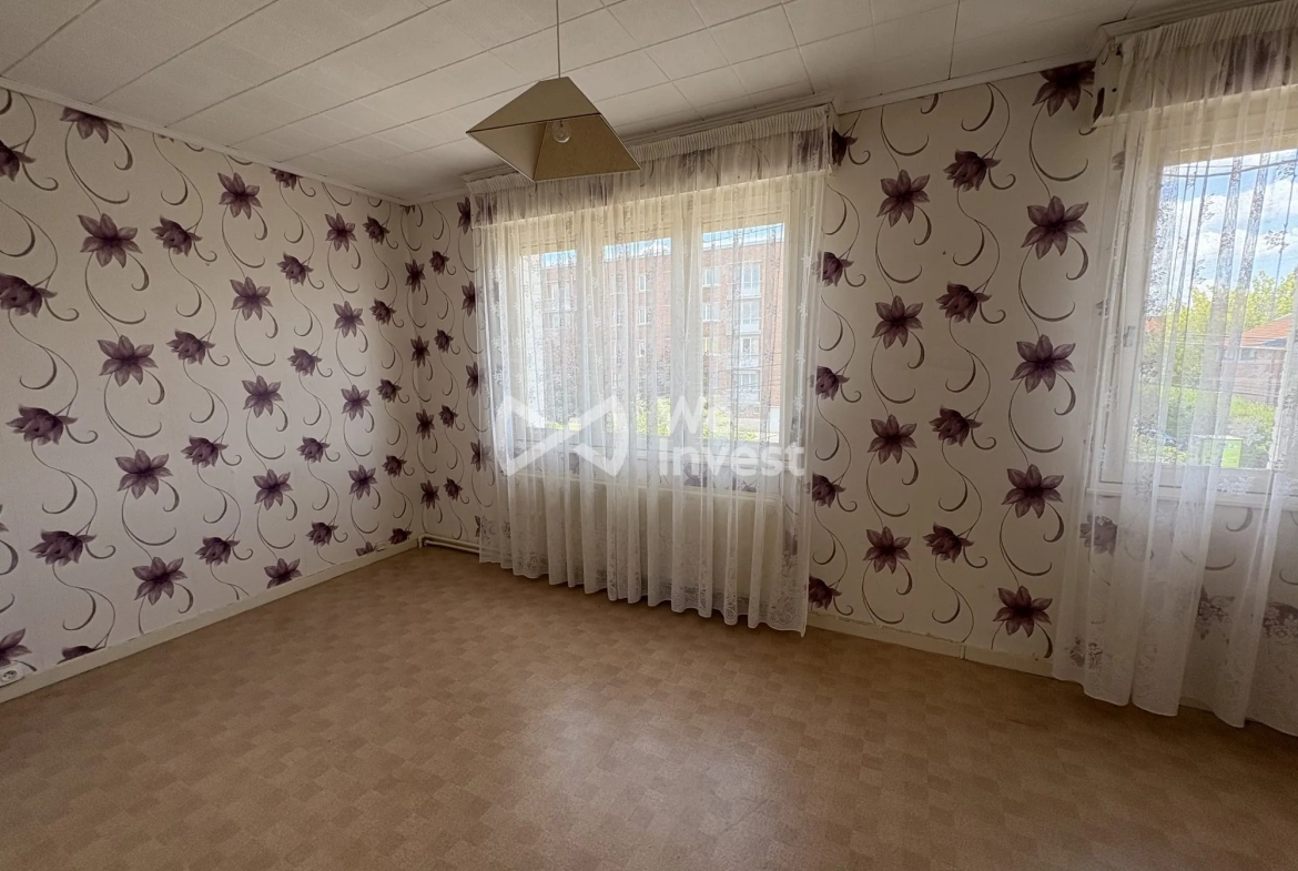 Maison à vendre à Aulnoye-Aymeries de 70 m² avec jardin et potentiel de rénovation 