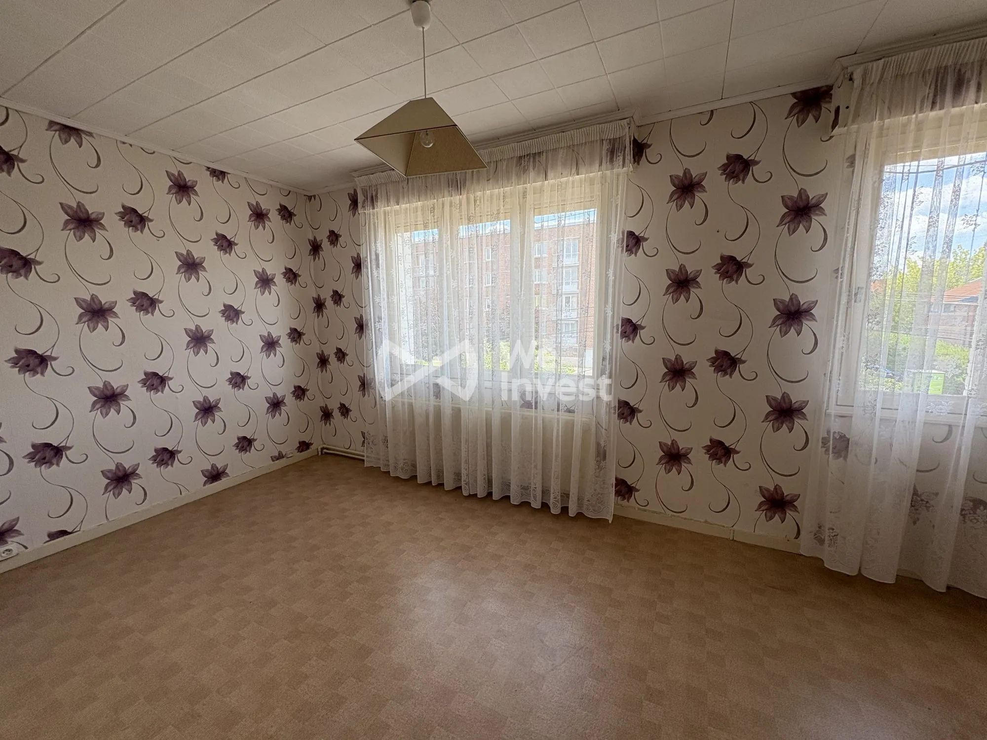 Maison à vendre à Aulnoye-Aymeries de 70 m² avec jardin et potentiel de rénovation 