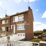 Maison à vendre à Aulnoye-Aymeries de 70 m² avec jardin et potentiel de rénovation