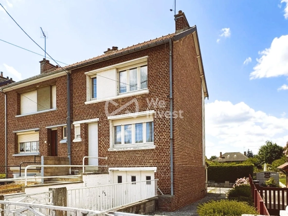 Maison à vendre à Aulnoye-Aymeries de 70 m² avec jardin et potentiel de rénovation
