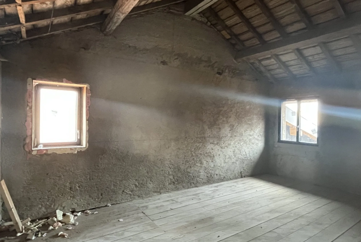 Plateau à vendre à Saint-Lager de 150 m² avec terrasse, jardin et parking 