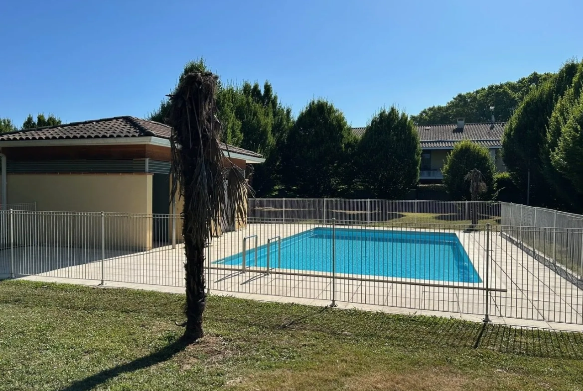 Appartement T2 à vendre à Cazères avec terrasse et parking - Investissement rentable 