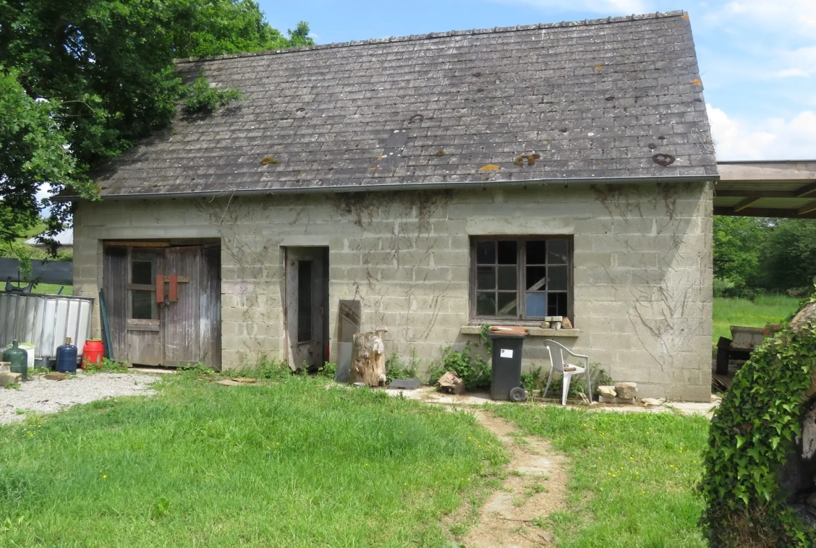 Maison à Guichen avec terrain et hangar à rénover en proche gare 