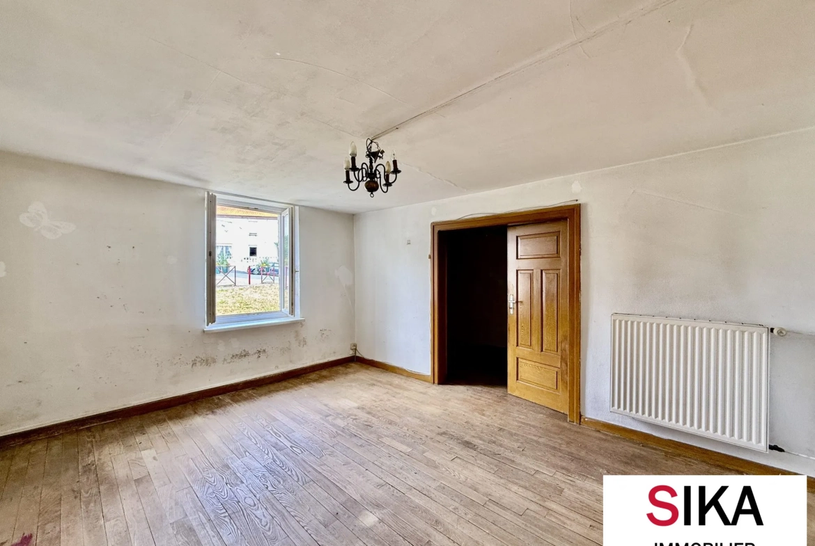 Maison individuelle à Héming avec grand jardin et potentiel de rénovation 