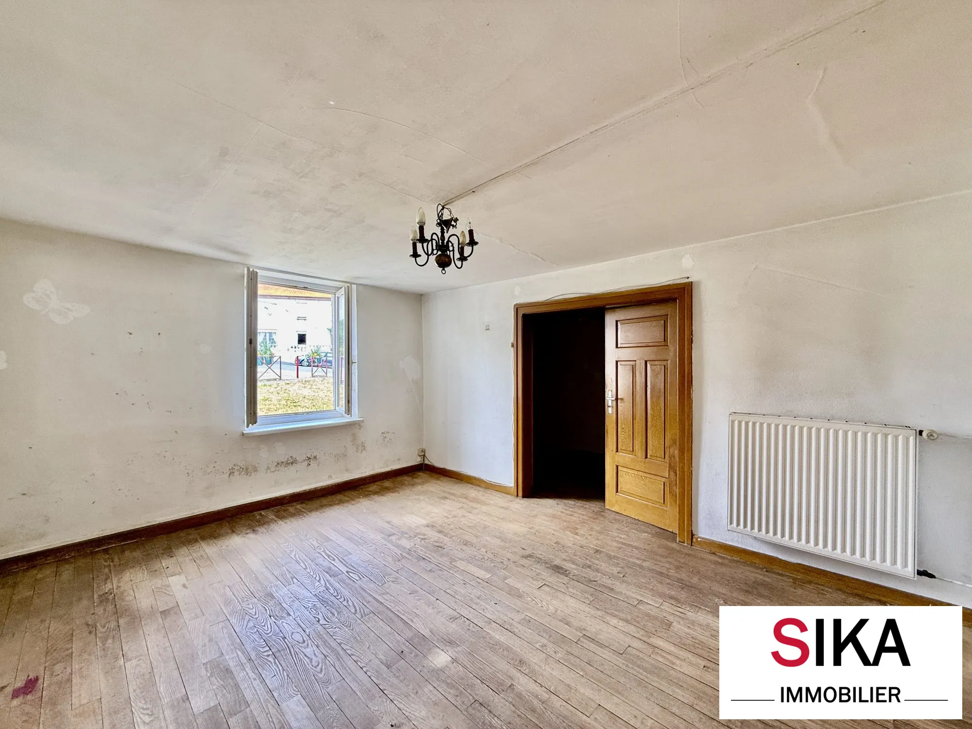 Maison individuelle à Héming avec grand jardin et potentiel de rénovation 