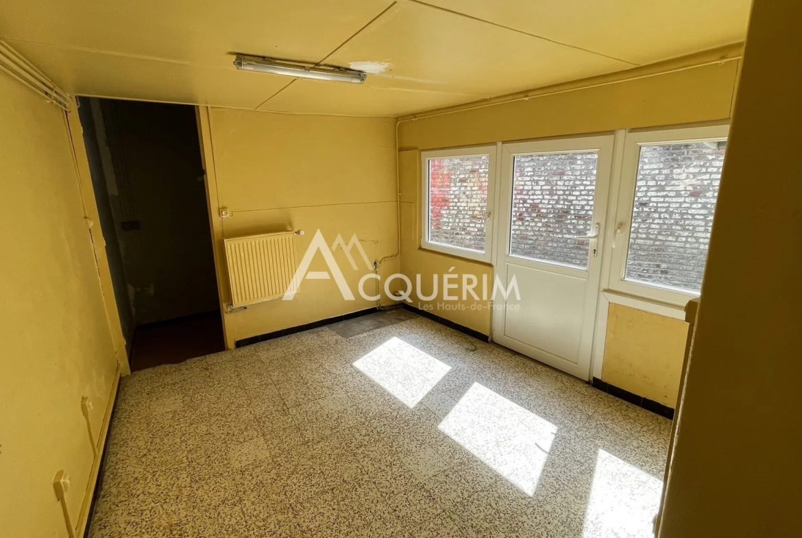 Immeuble de 120 m² à vendre à Carvin, idéal pour activité commerciale 