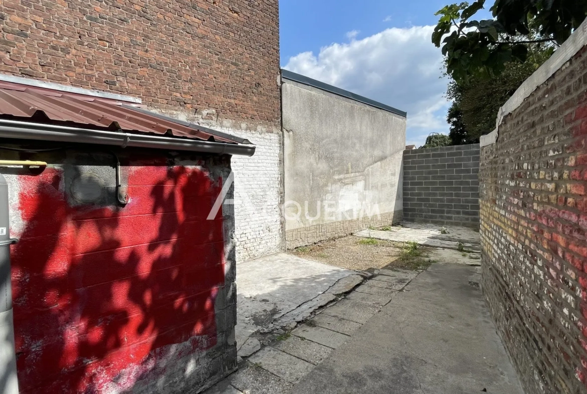 Immeuble de 120 m² à vendre à Carvin, idéal pour activité commerciale 