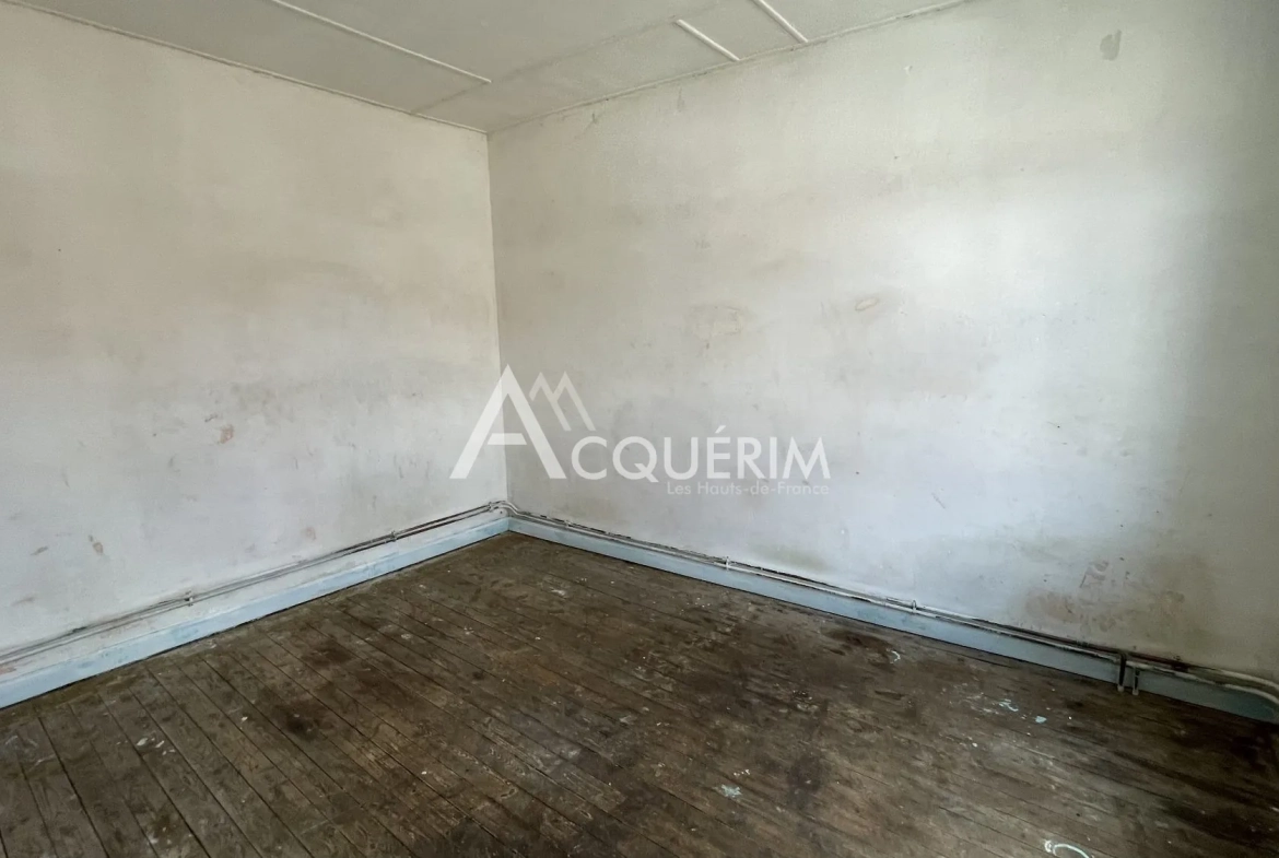 Immeuble de 120 m² à vendre à Carvin, idéal pour activité commerciale 