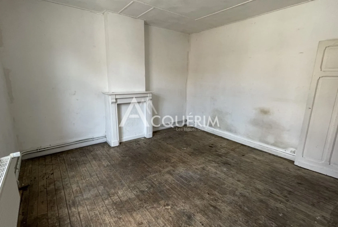 Immeuble de 120 m² à vendre à Carvin, idéal pour activité commerciale 