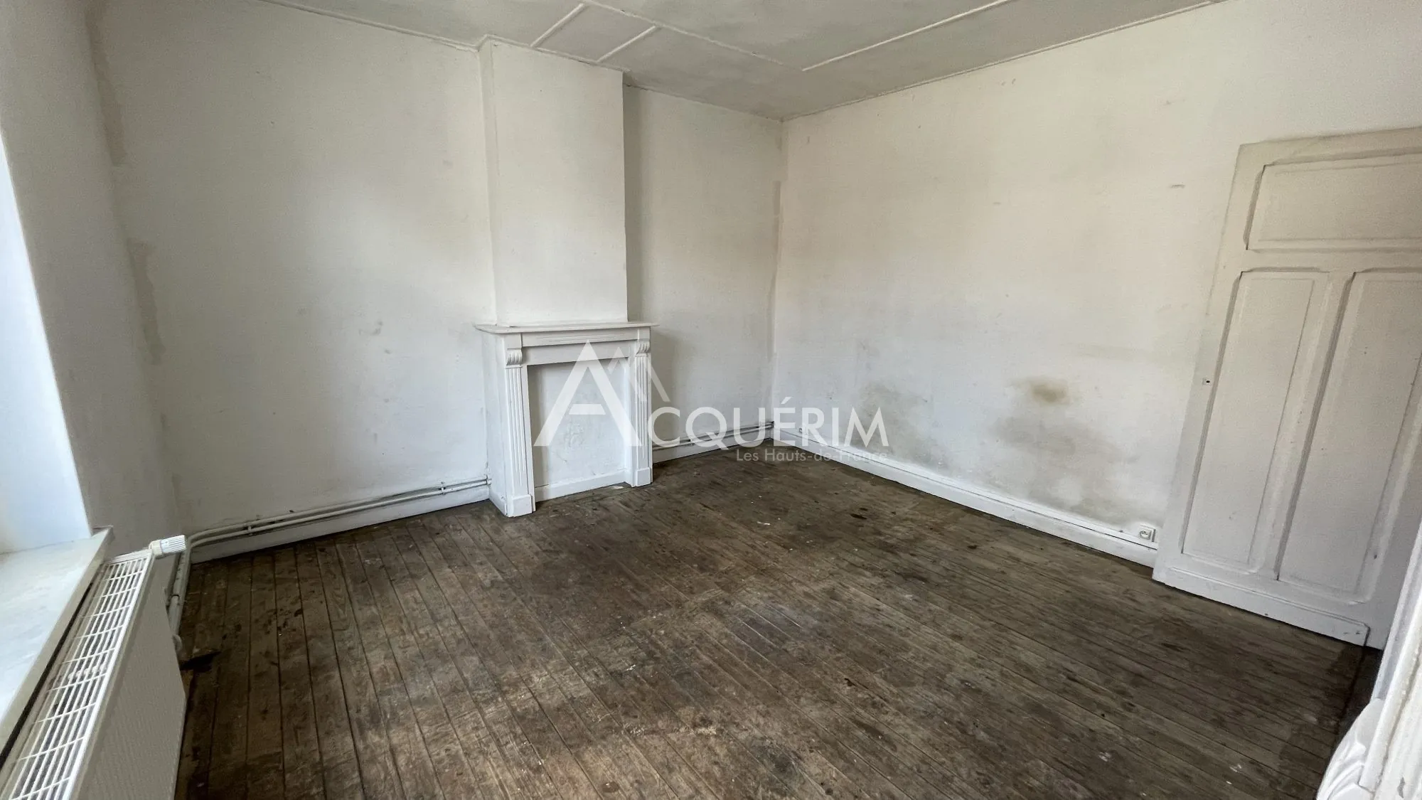 Immeuble de 120 m² à vendre à Carvin, idéal pour activité commerciale 
