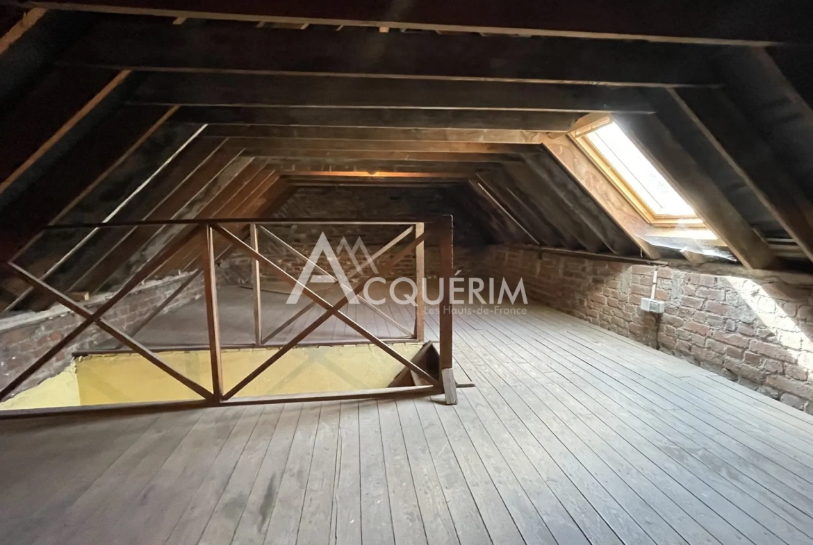 Immeuble de 120 m² à vendre à Carvin, idéal pour activité commerciale 
