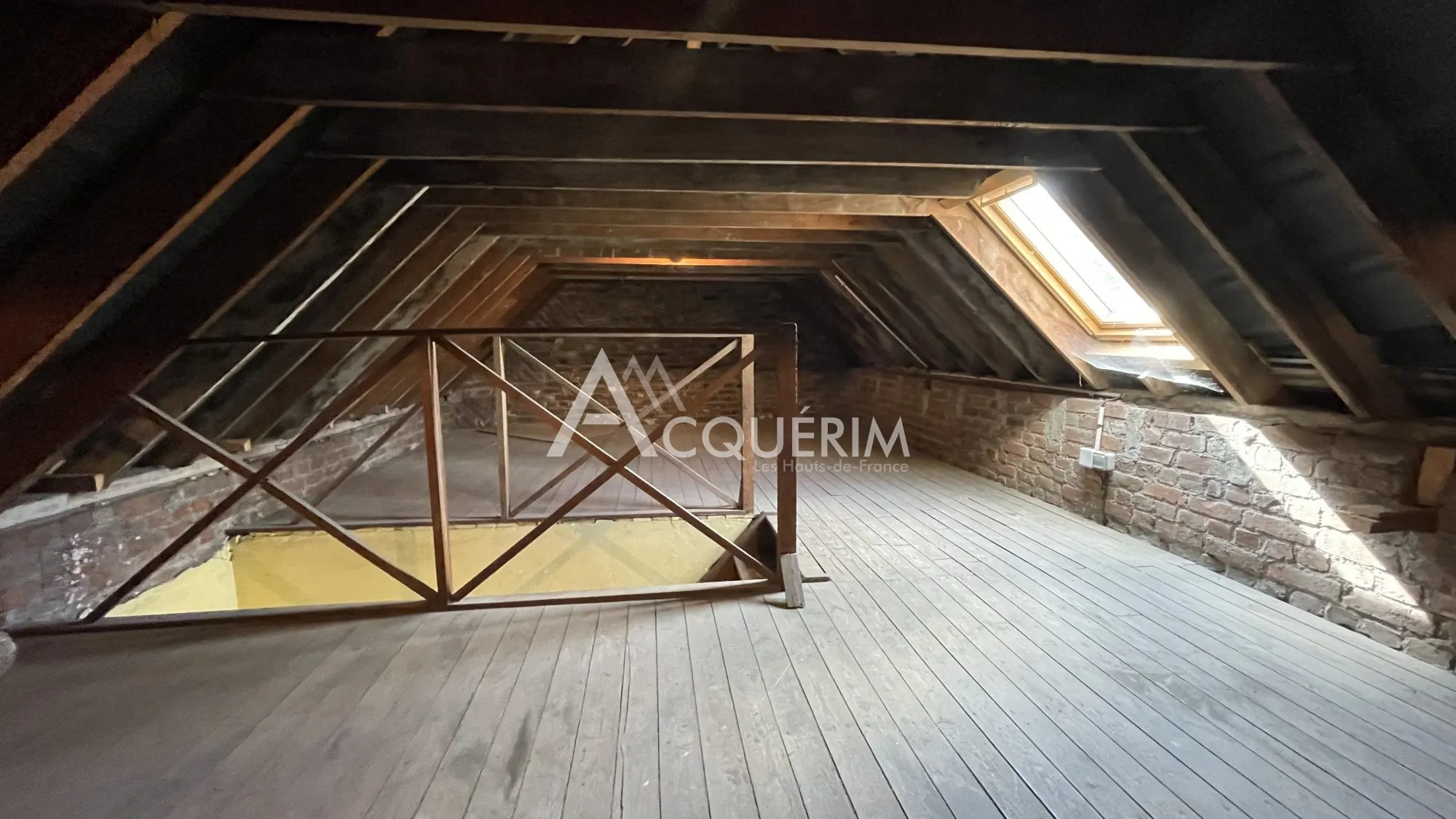 Immeuble de 120 m² à vendre à Carvin, idéal pour activité commerciale 