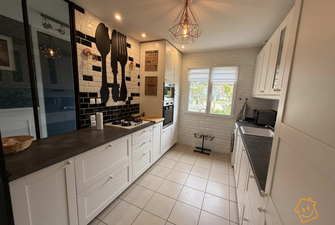 Maison de plain-pied à vendre à Mehun-sur-Yèvre avec jardin et garage 
