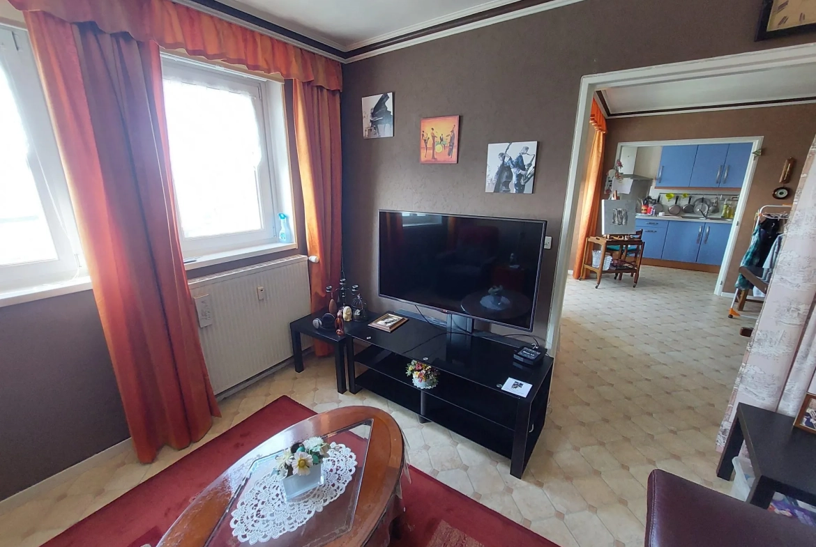 Appartement 4 chambres avec vue exceptionnelle à Tourcoing - Dernier étage, parking et cave 