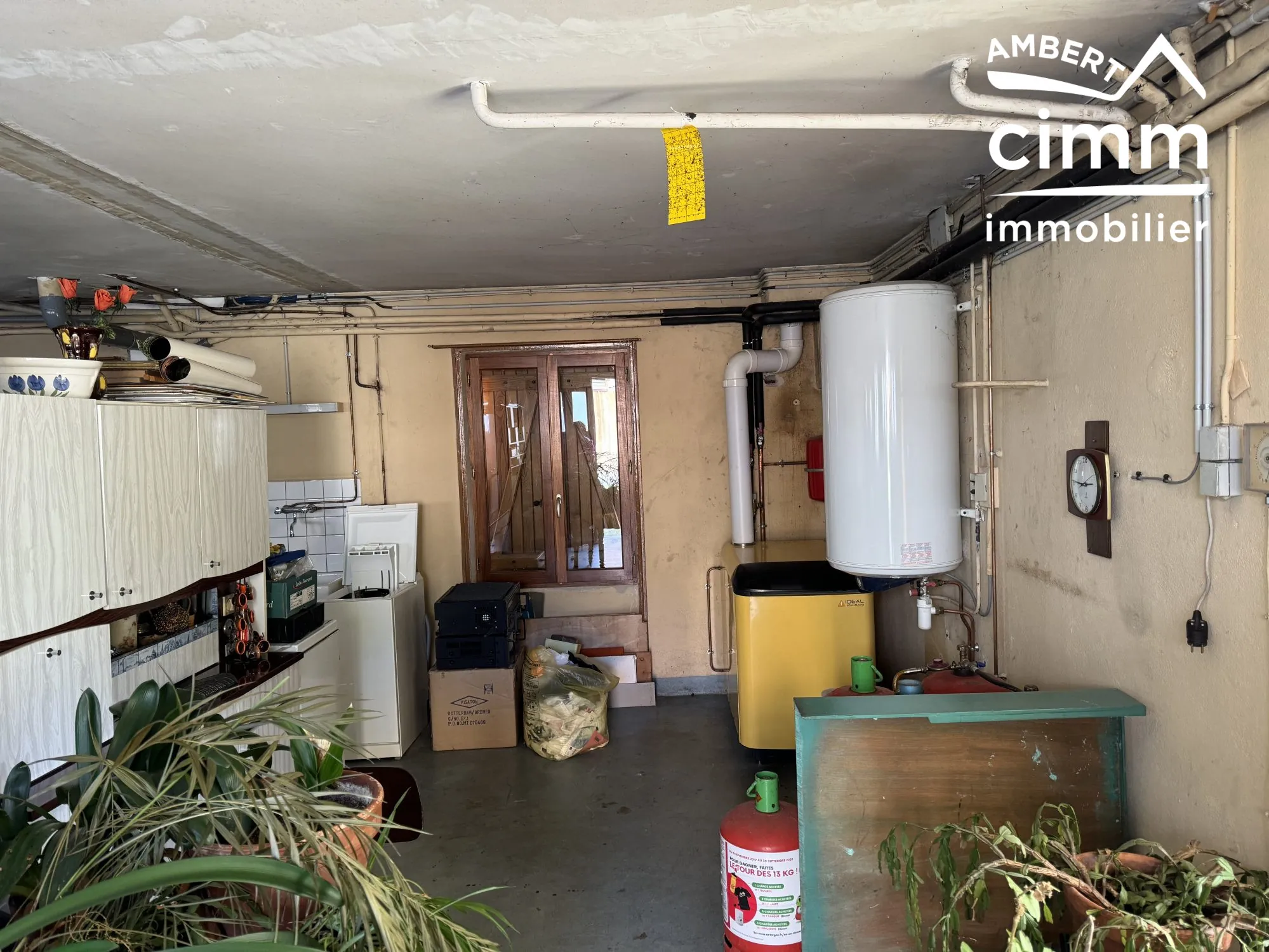 Maison de 59 m² avec double garage et jardin à Olliergues 