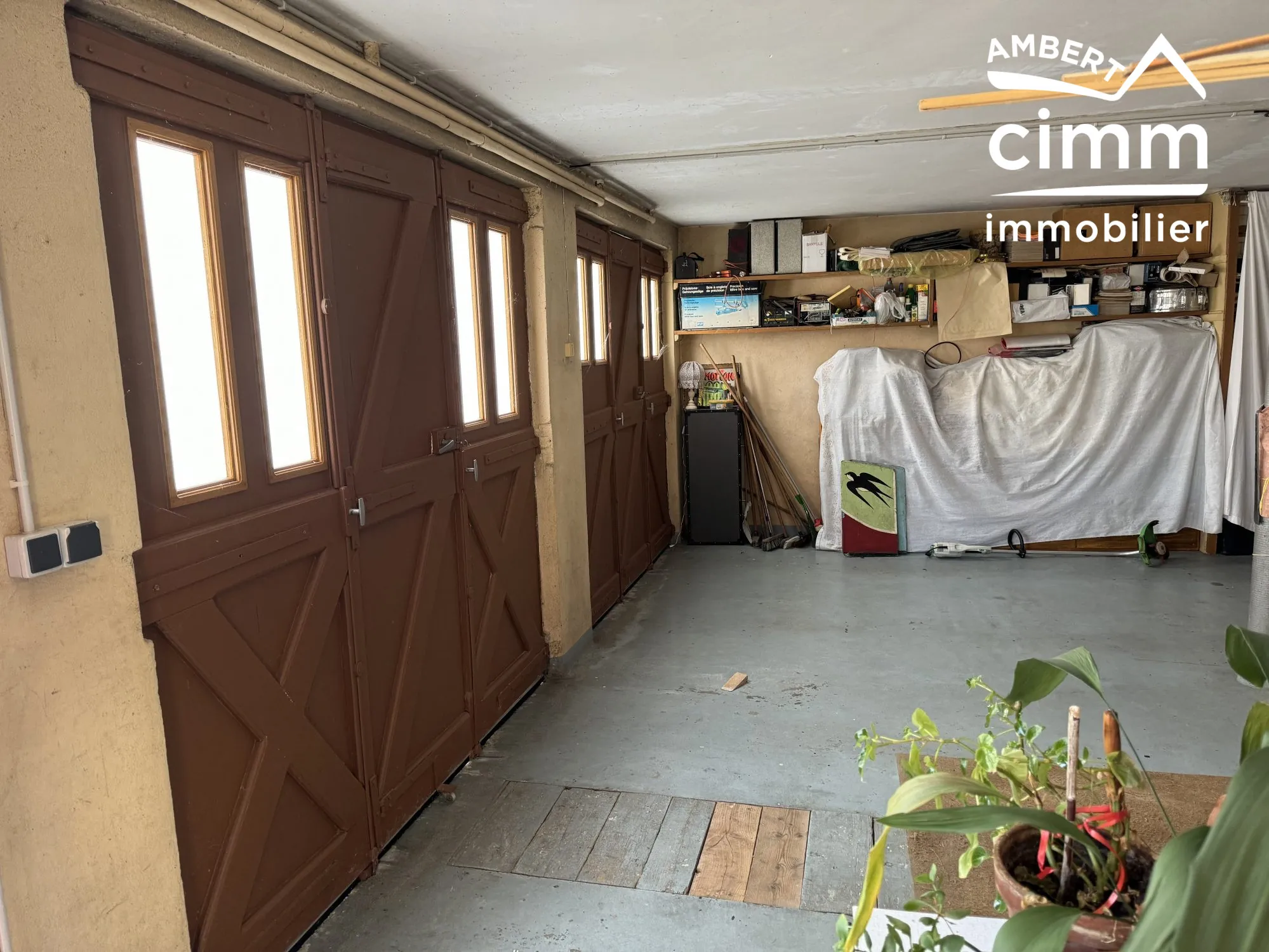 Maison de 59 m² avec double garage et jardin à Olliergues 