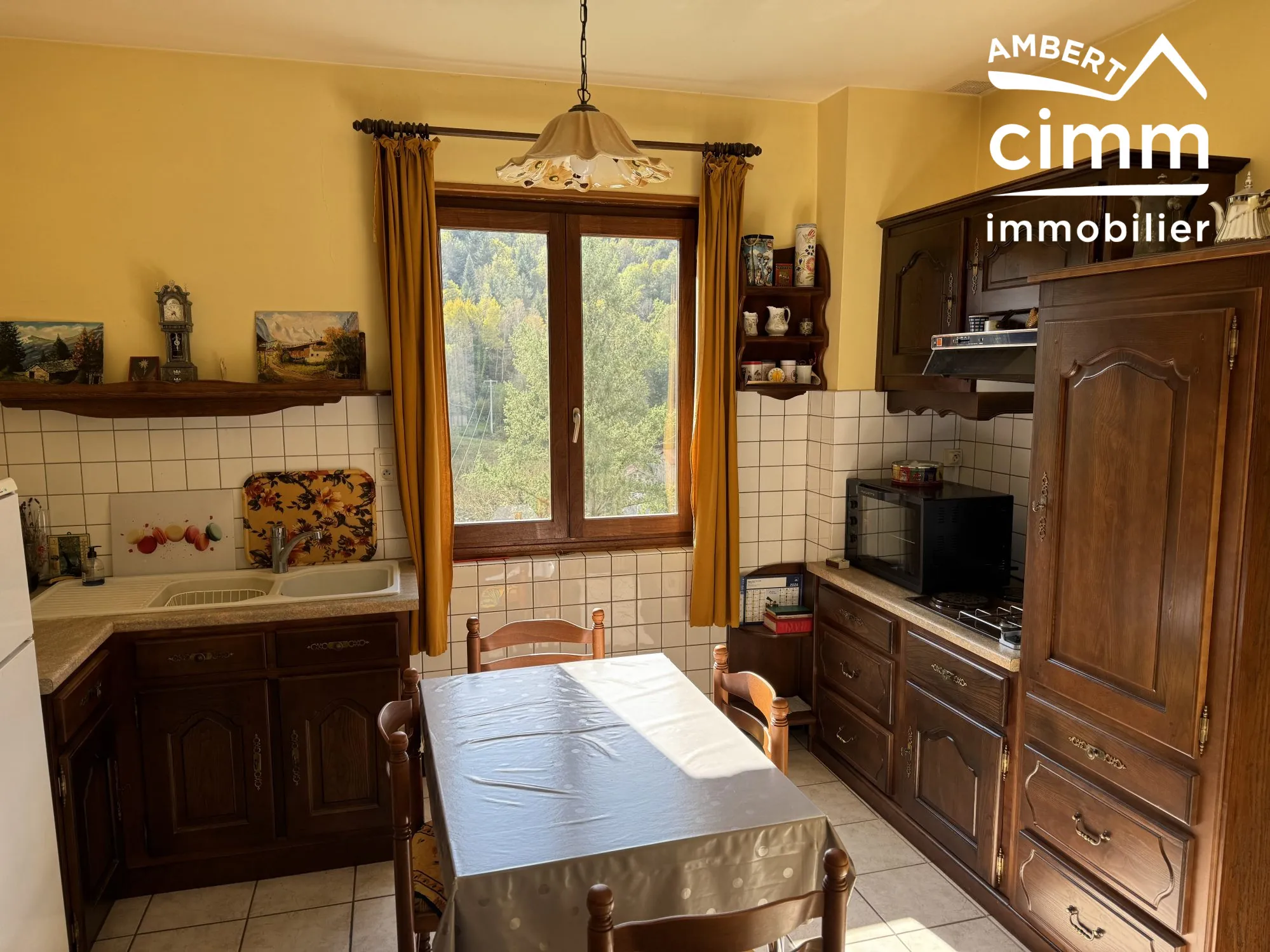 Maison de 59 m² avec double garage et jardin à Olliergues 