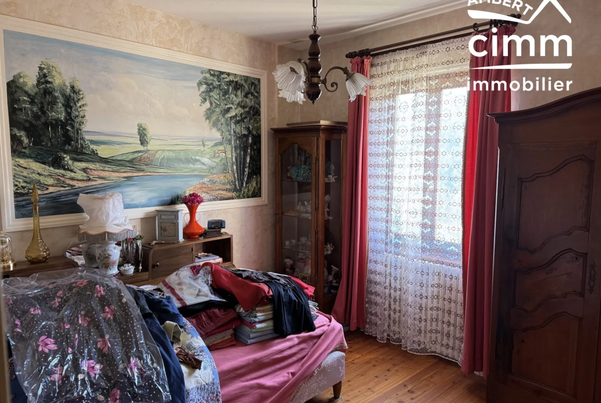 Maison de 59 m² avec double garage et jardin à Olliergues 