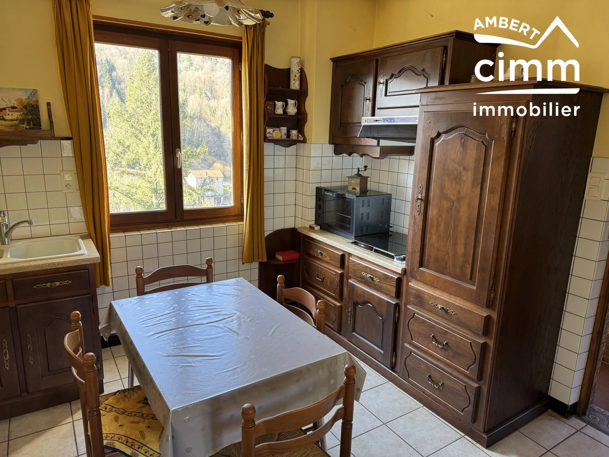 Maison de 59 m² avec double garage et jardin à Olliergues 