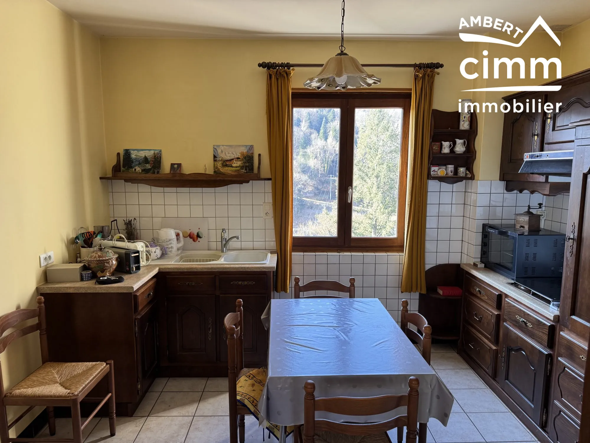 Maison de 59 m² avec double garage et jardin à Olliergues 