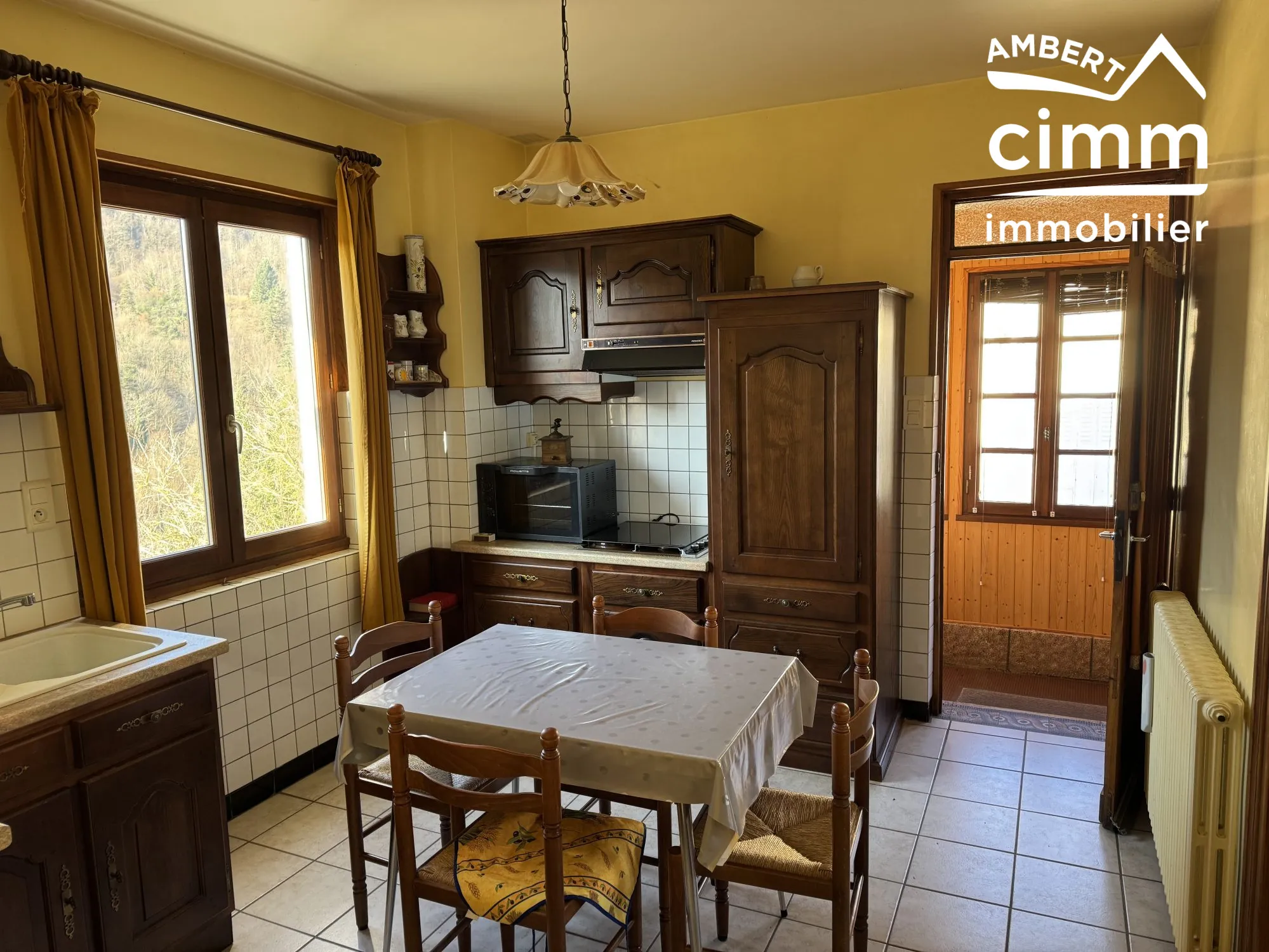 Maison de 59 m² avec double garage et jardin à Olliergues 