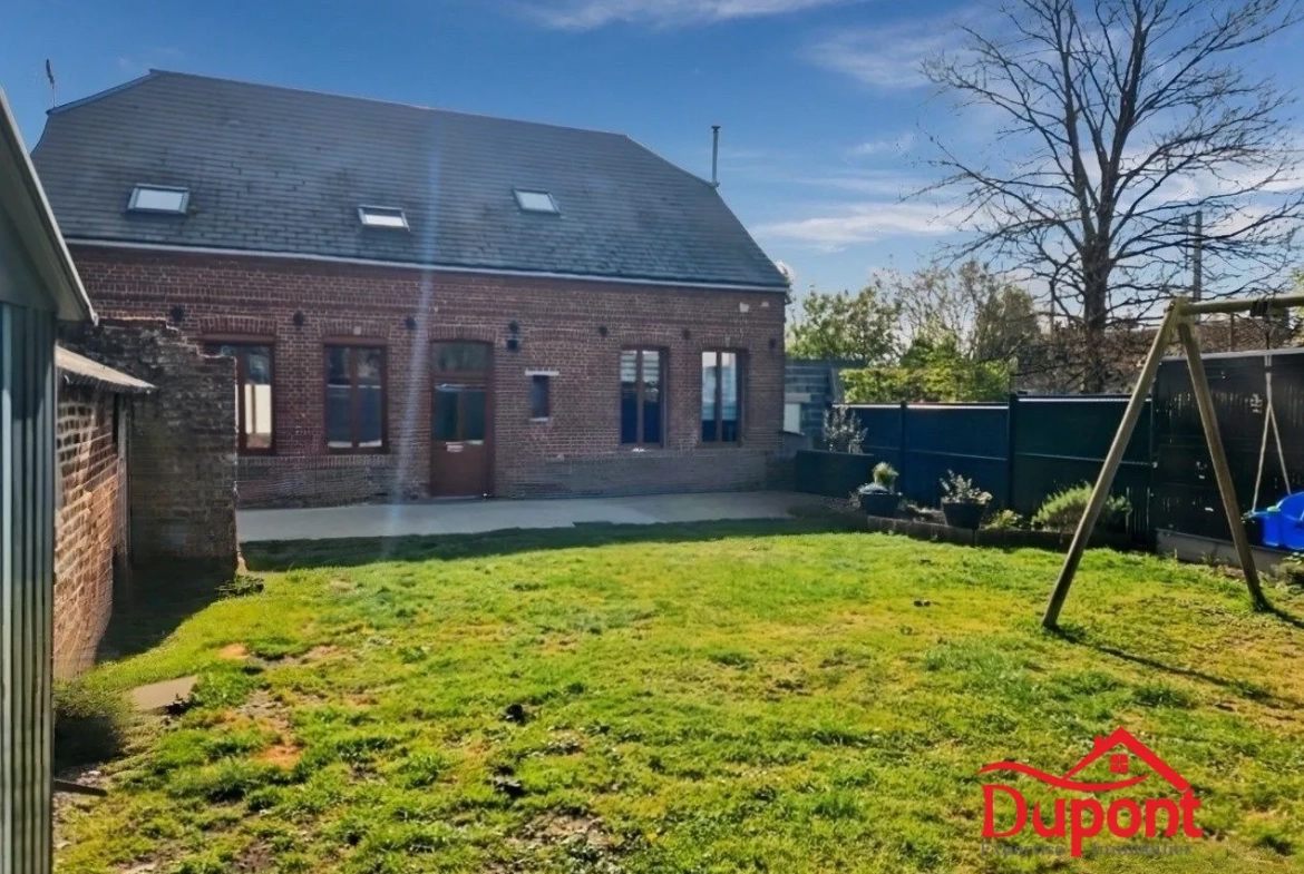 Maison familiale rénovée avec jardin et garage à Troisvilles 
