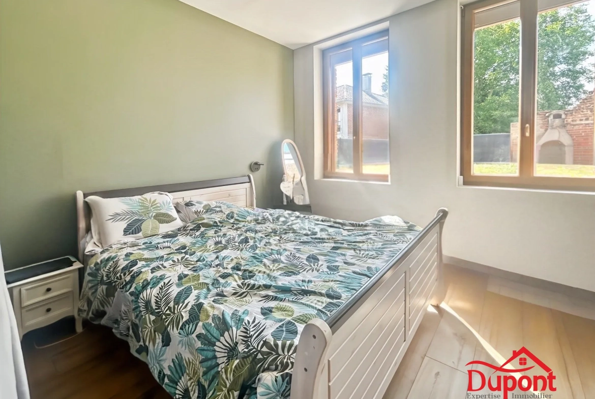 Maison familiale rénovée avec jardin et garage à Troisvilles 