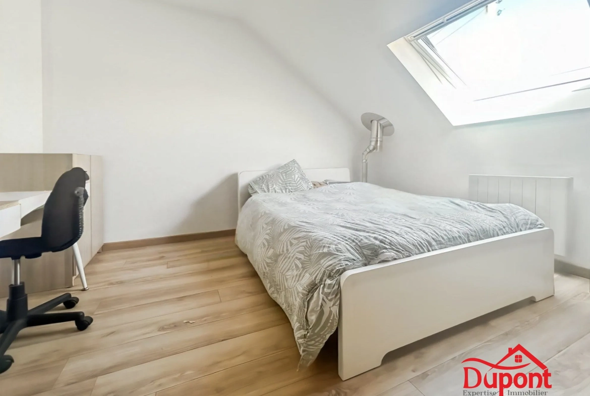 Maison familiale rénovée avec jardin et garage à Troisvilles 
