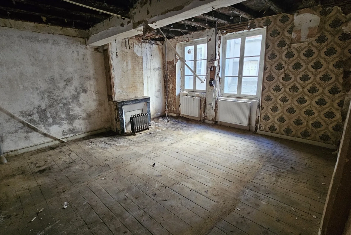 Immeuble à rénover avec fort potentiel à Tulle, centre historique 