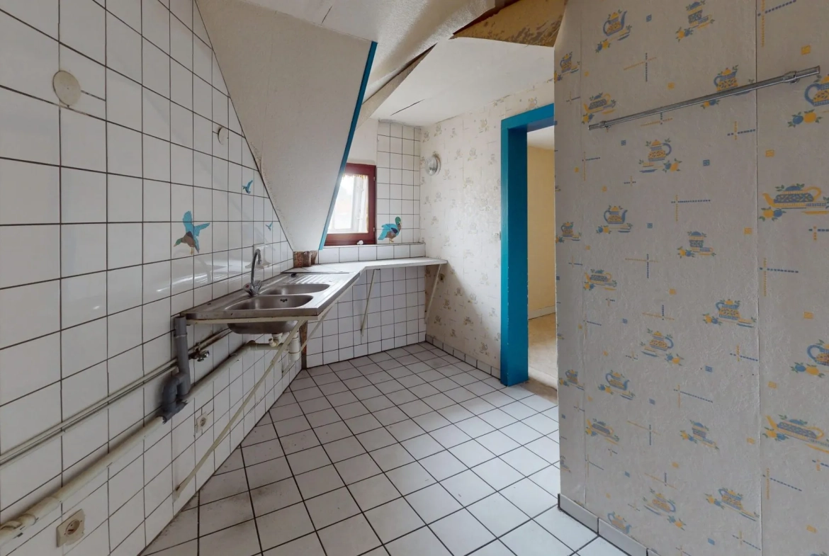 Appartement T1 à Nancy proche de la gare - Opportunité à rénover 