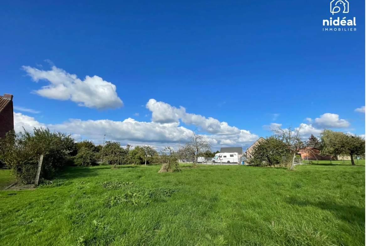 Terrain constructible de 1664 m² à Berlaimont avec permis et exposition sud 