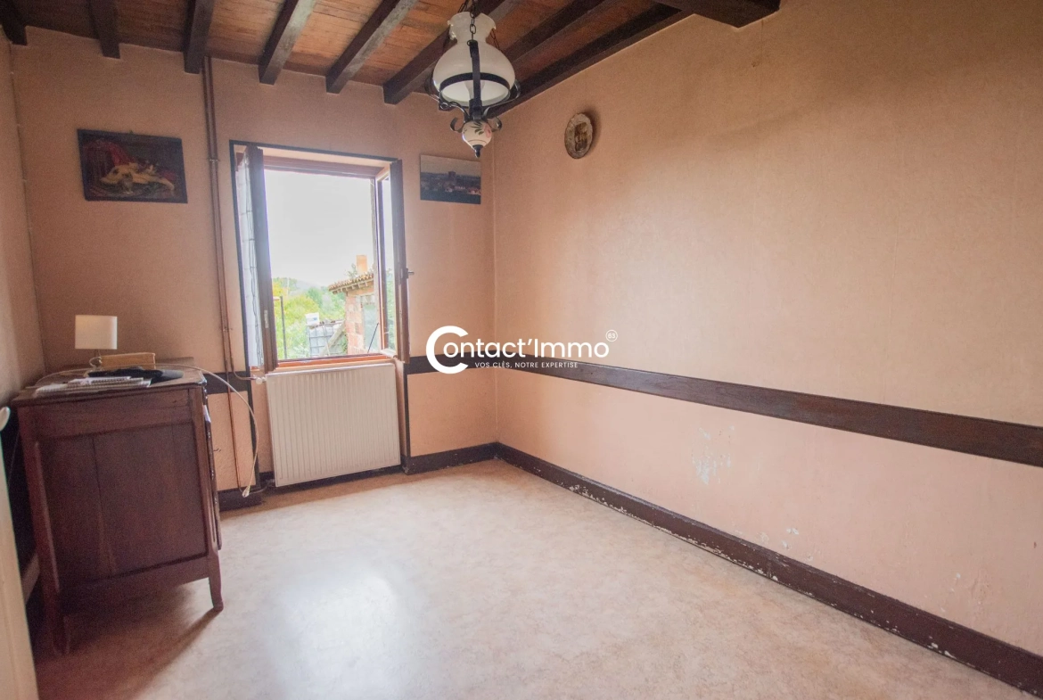 Maison à Moissat avec 4 chambres, grande parcelle et dépendances - Opportunité à saisir 