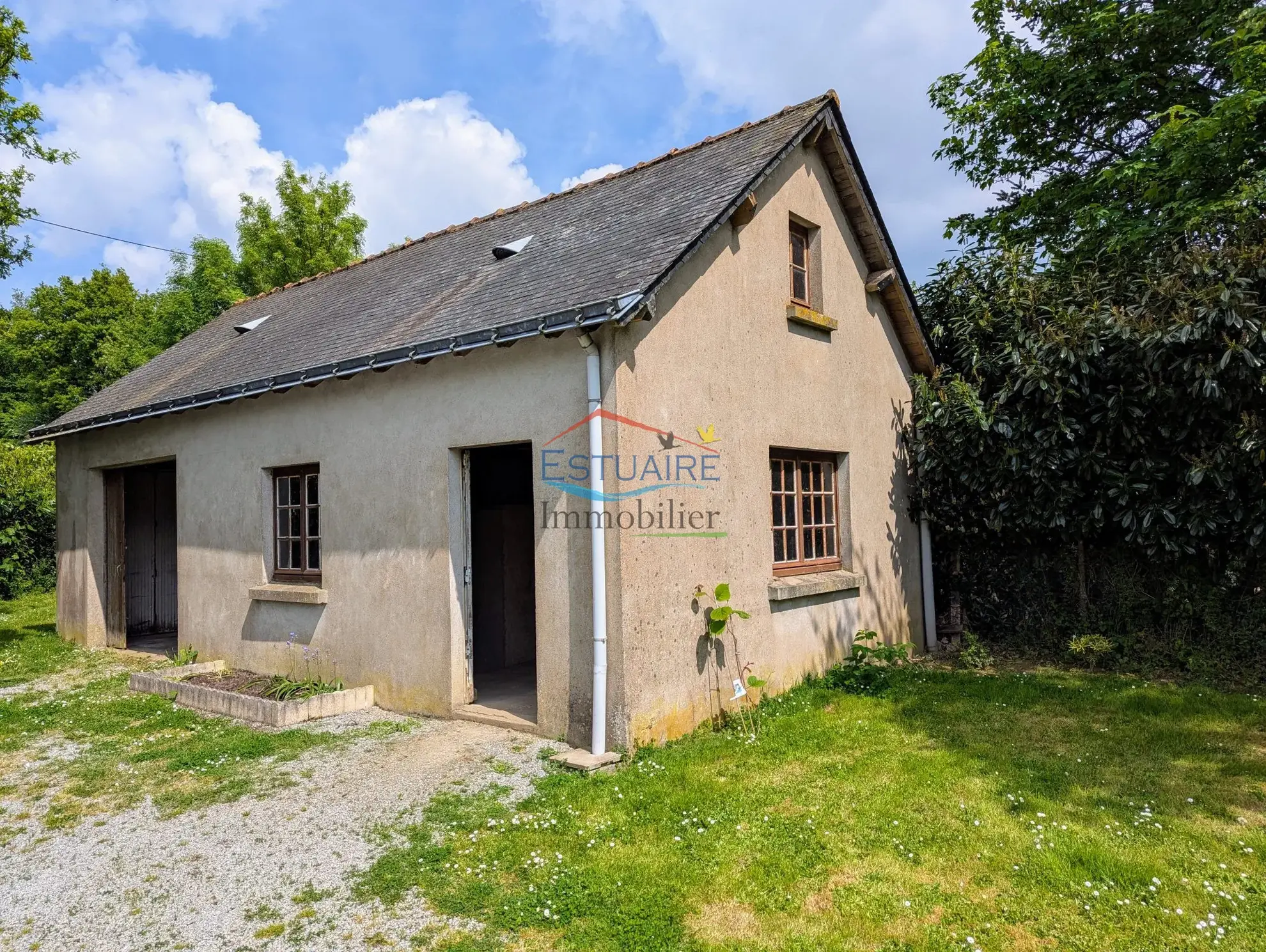 Maison à vendre avec 2 chambres, garage et jardin à Saffré - Nantes 