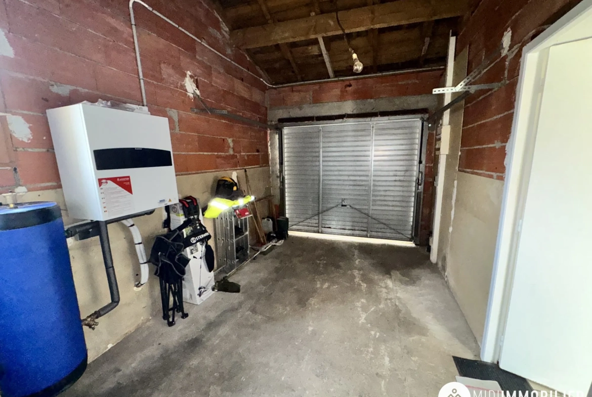 Maison de campagne rénovée à Monestiés – 103 m² avec grand terrain et garage 