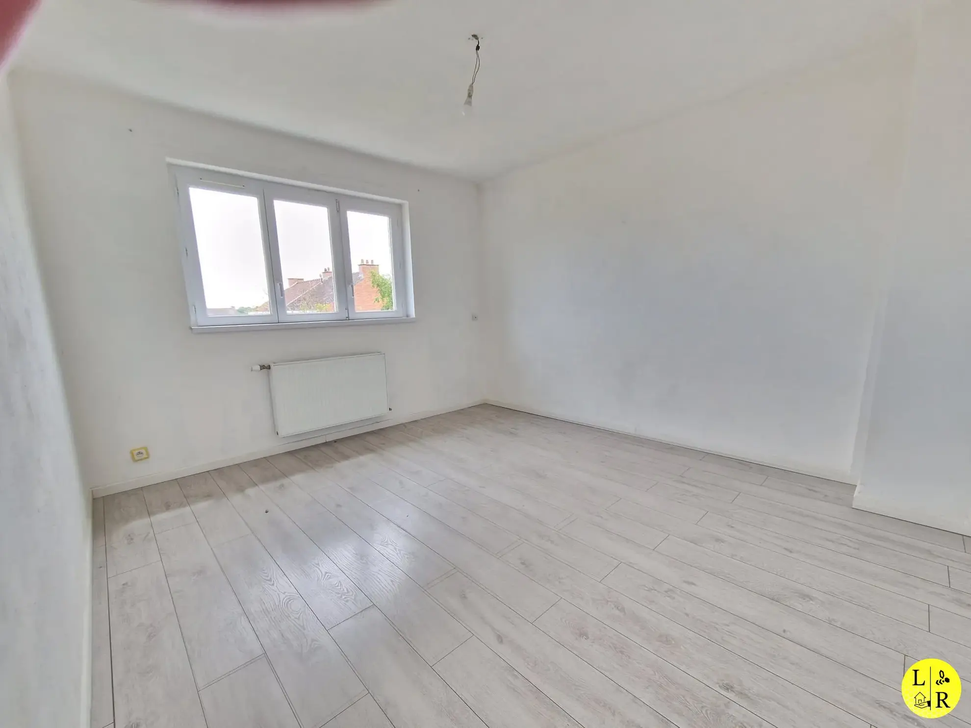 Maison mitoyenne 3 chambres avec jardin et garage à Arras 