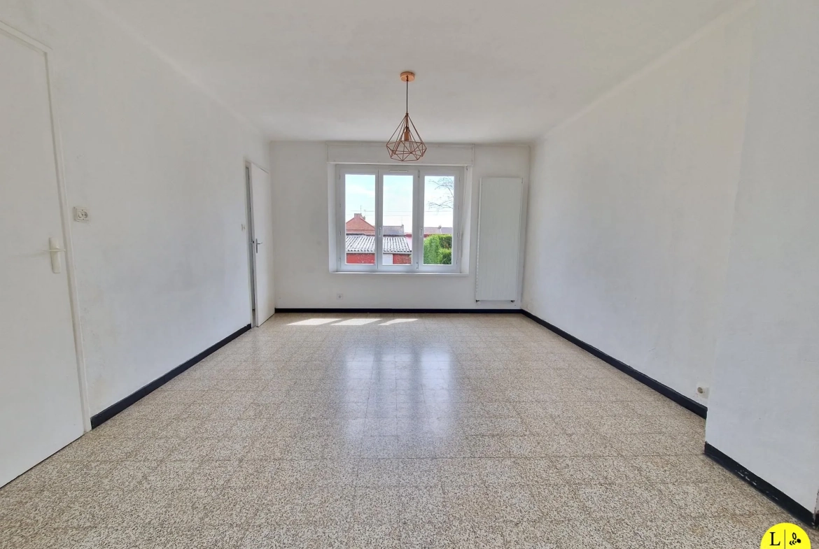 Maison mitoyenne 3 chambres avec jardin et garage à Arras 