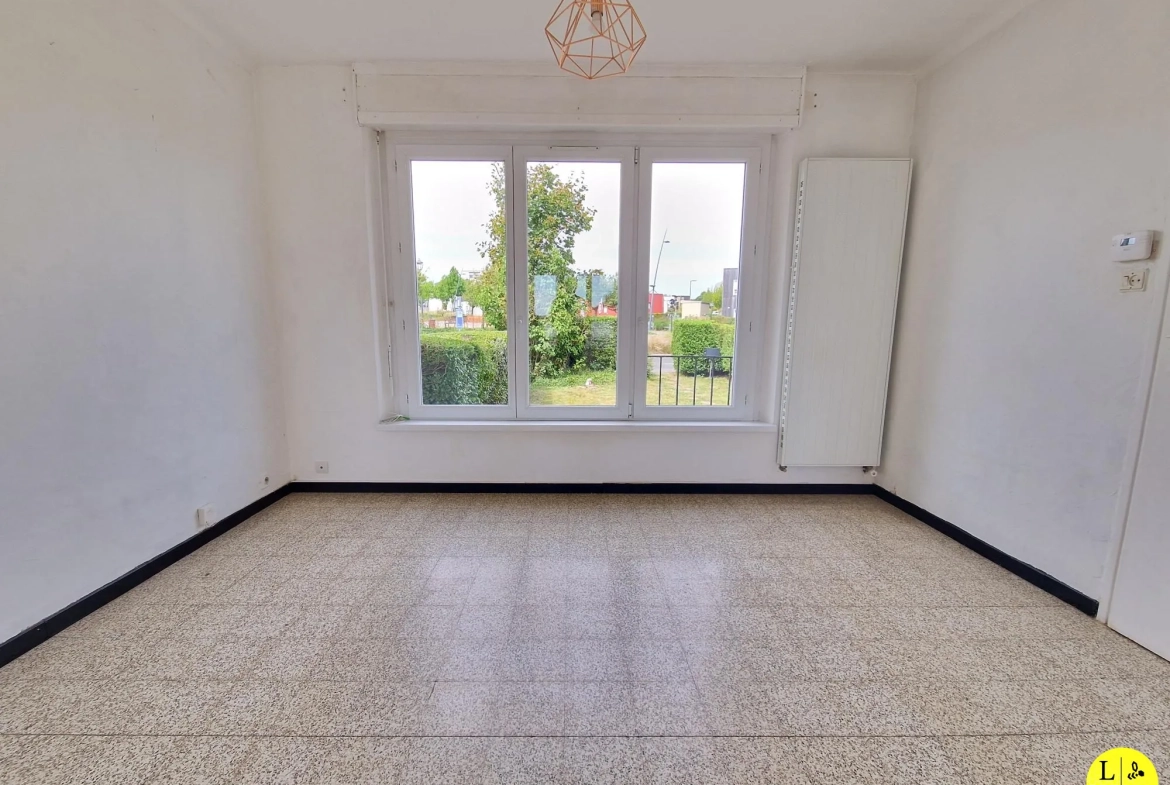 Maison mitoyenne 3 chambres avec jardin et garage à Arras 